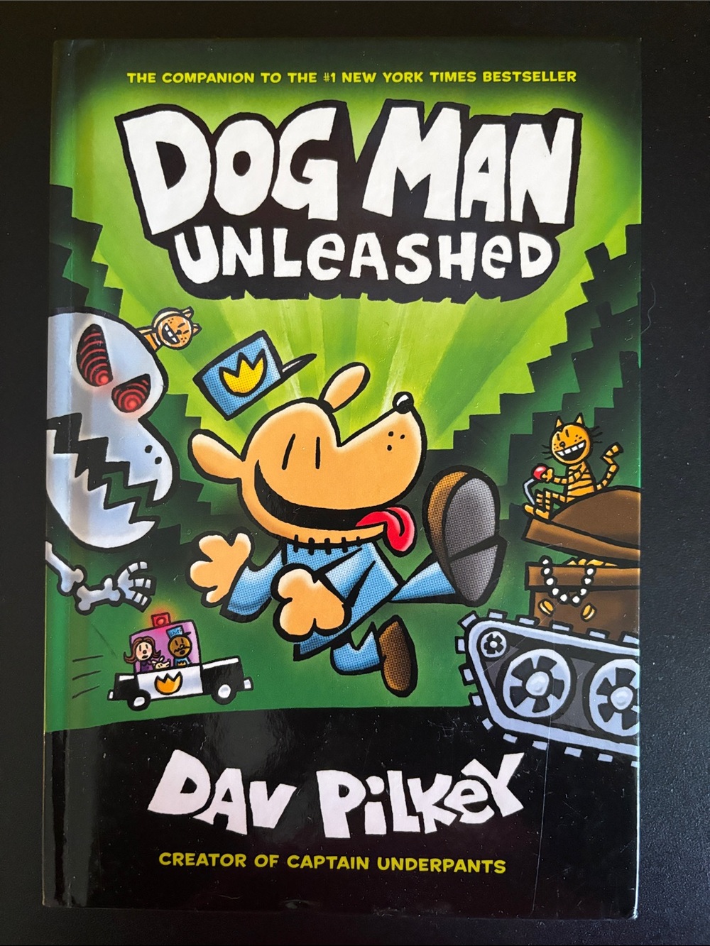 Scholastic Dog Man Unleashed — Bright Green Cover with Black Accents